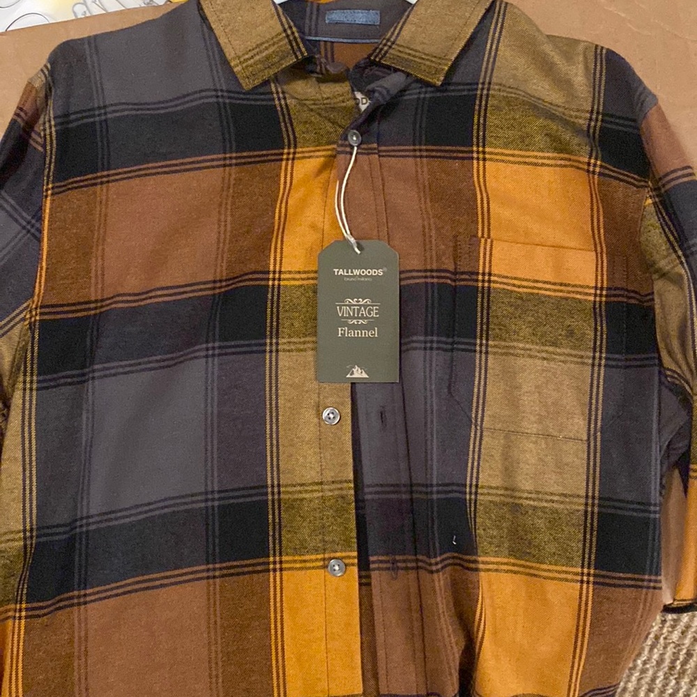 Flannel. Black and brown plaid. Size SMALL